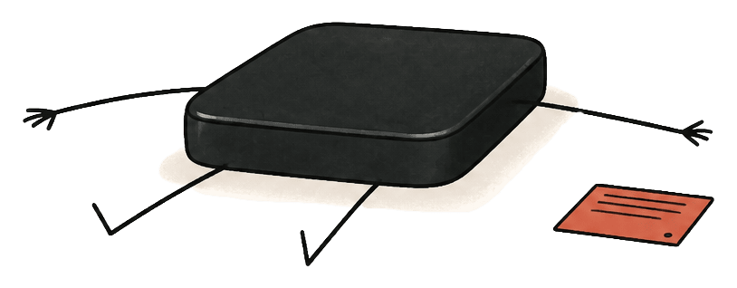 A desk device lying face down with its limbs out, recording the incident